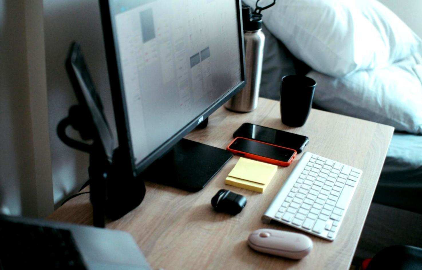 Person reviewing investment terms on laptop